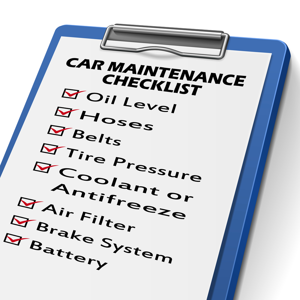 car maintenance checklist clipboard with check boxes marked for equipments of car